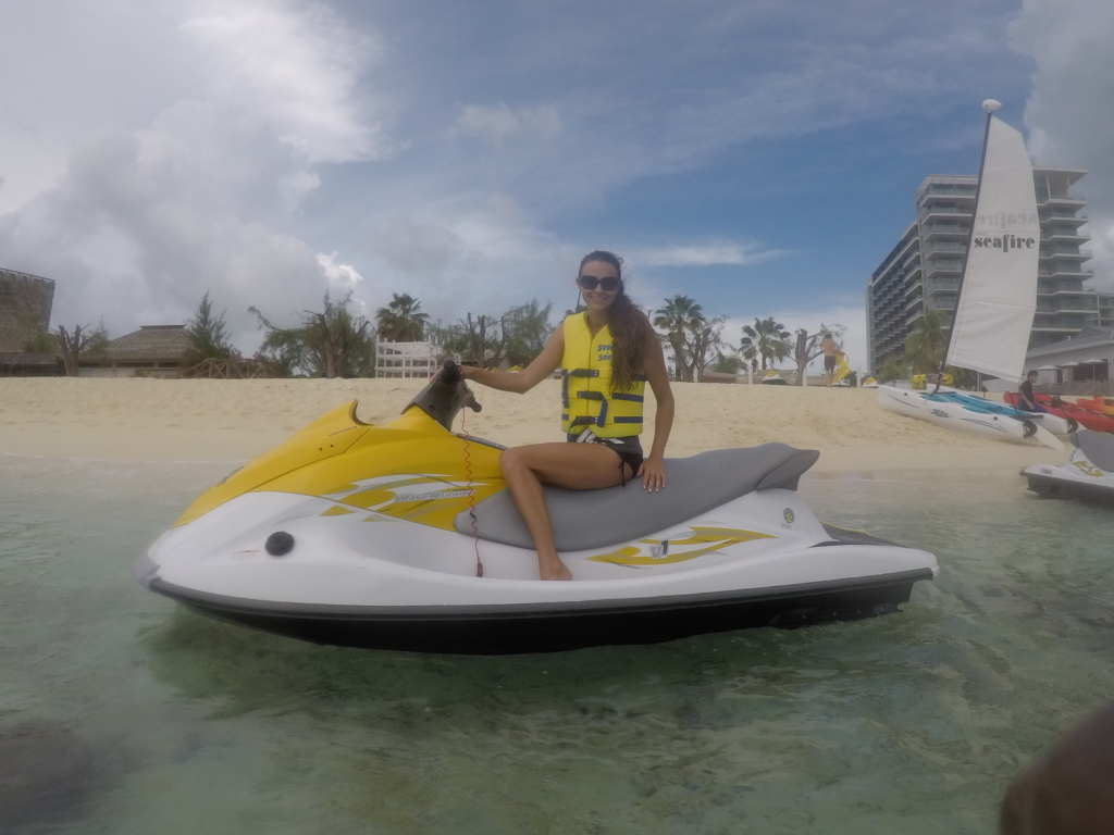 Jet ski in The Cayman Islands | Caribbean vacation | THings to do in the CAymans | Mandy Carter travel writer | Florida travel blog | cayman vacation | Acupful.com family travel blogger | 7 mile beach snorkel | Red Sail Sports | Swim with Stingrays | Starfish Point | Seafire Resort & Spa | Kimpton Hotels Grand Cayman